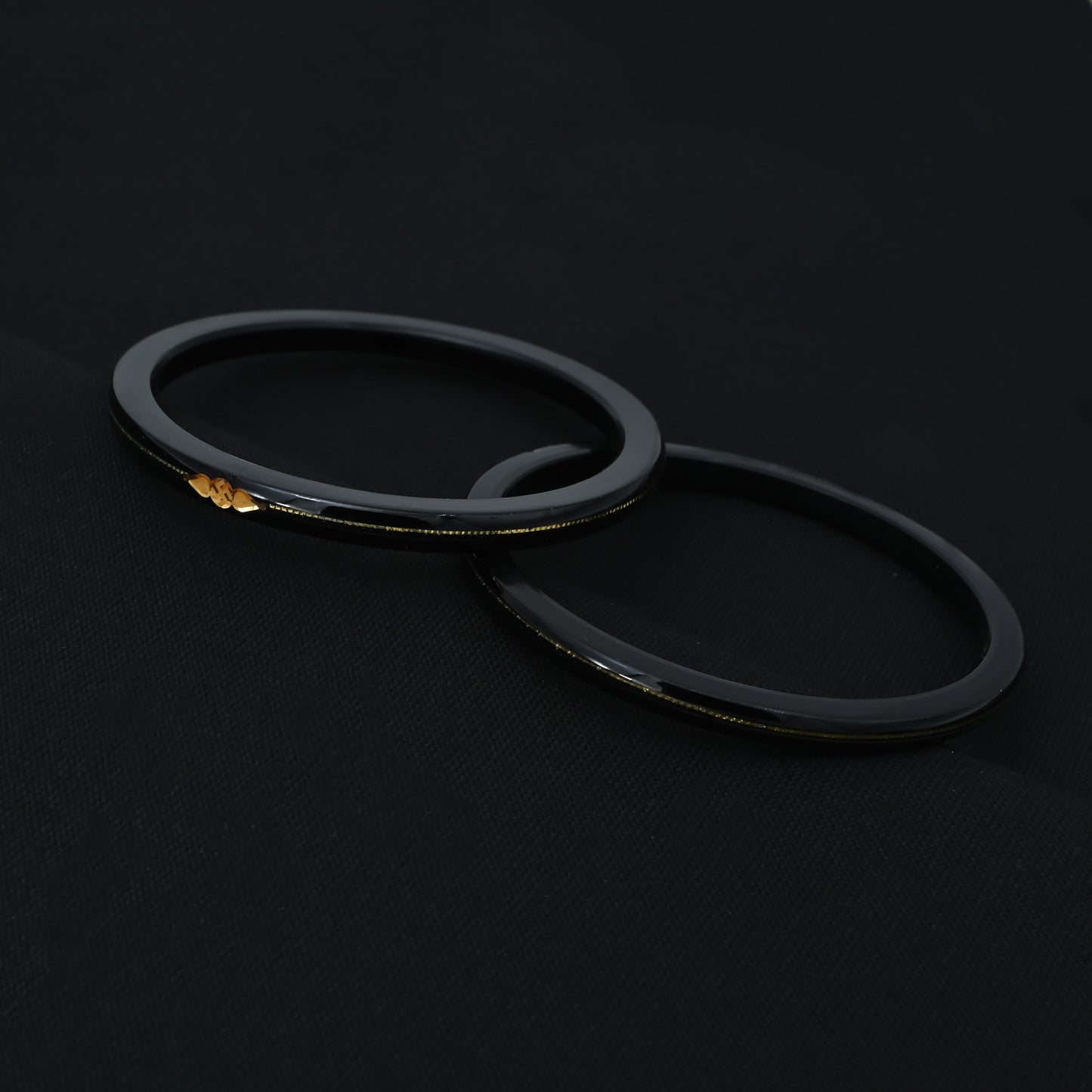 Silver Center Swathik Design Black Bangles