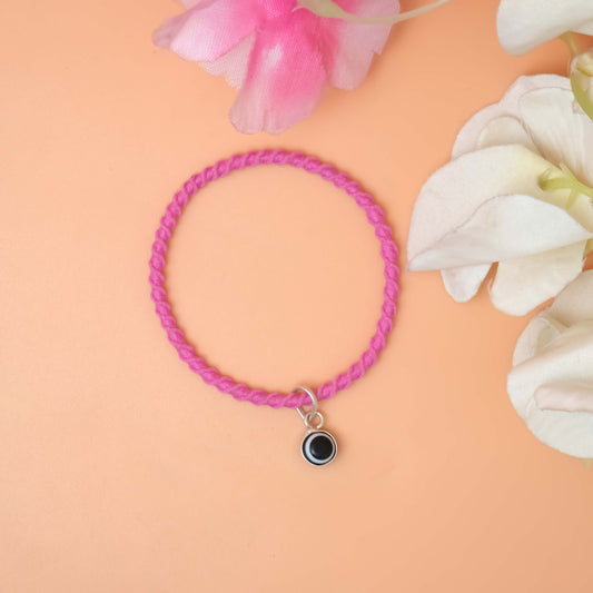 Bracelet with a bold black Evil eye charm