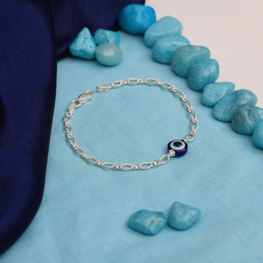 Sterling silver bracelet featuring a finely crafted evil eye charm