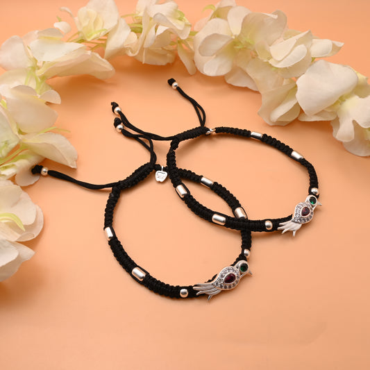 Elegant Silver Dhaga Anklet with Bird Motif and Red-Green Stones