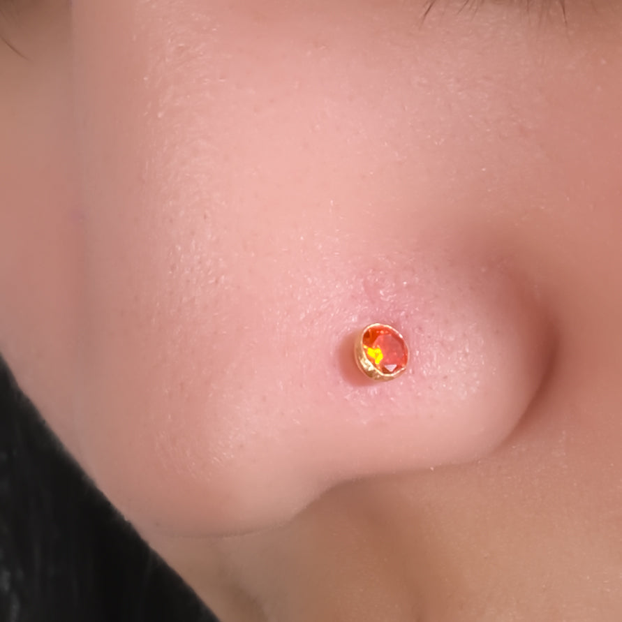 Gold Polish Nose Pin with Red Gemstone Accent