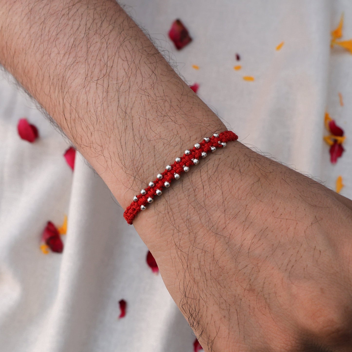 Unique Silver Rakhi with Bud Details