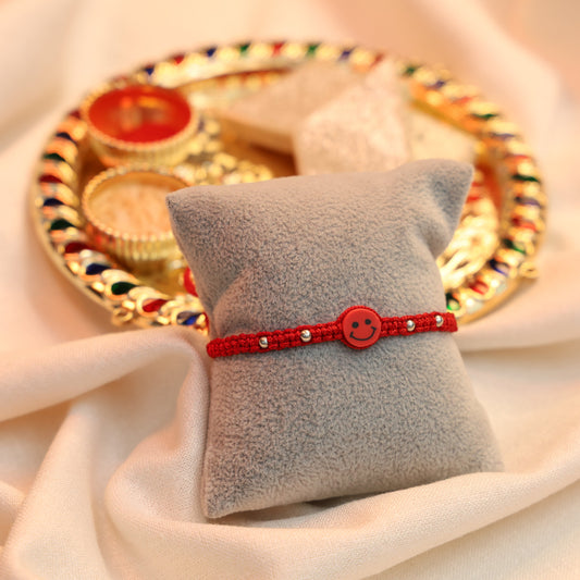 Joyful Red Smiley Rakhi in Silver