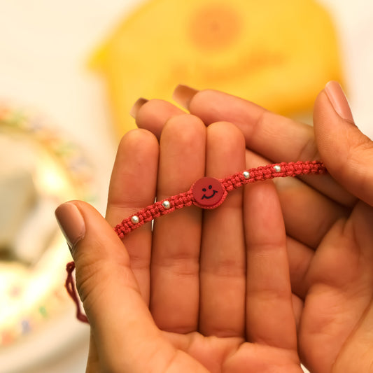 Joyful Red Smiley Rakhi in Silver