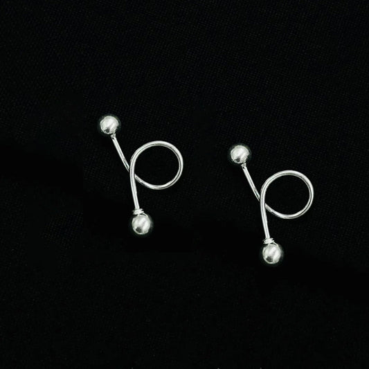 Chic minimalist double sphere silver earrings for modern elegance.