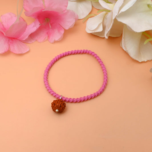 An Elegant Bracelet adorned with a small Rudraksha