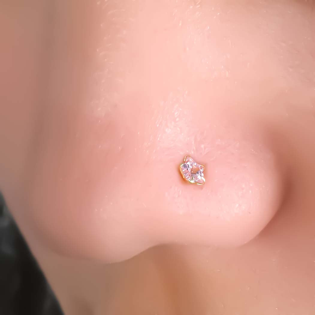 Gold Polish Nosepin Featuring Pink Star Stone