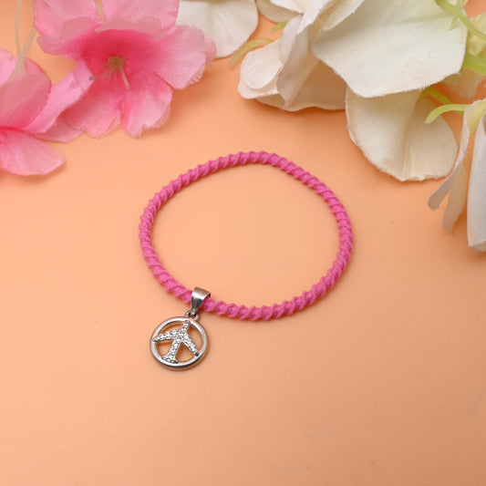 A Bracelet with a peace sign charm