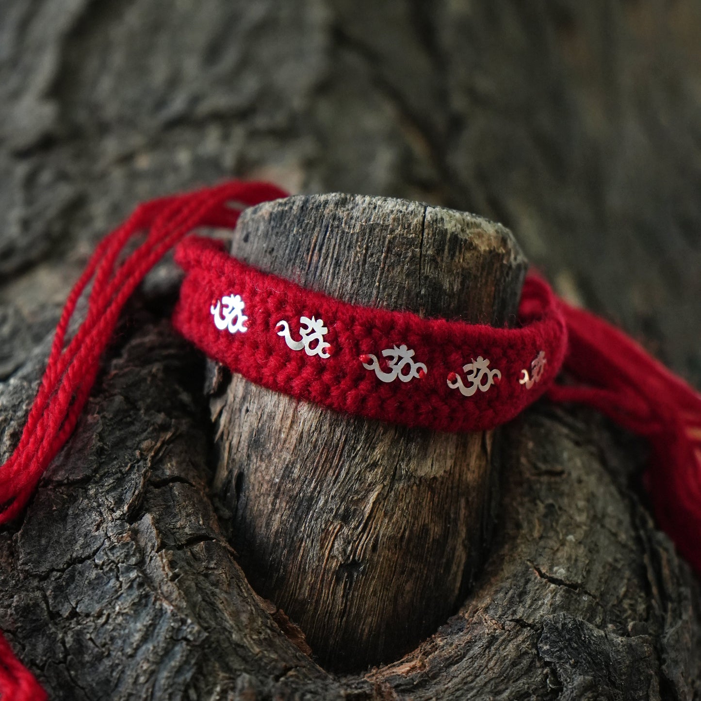 Silver Rakhi with Om Charm