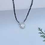 Load image into Gallery viewer, Modern black beads mangalsutra with oval stone pendant.