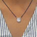 Load image into Gallery viewer, Modern black beads mangalsutra with oval stone pendant.