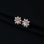 Load image into Gallery viewer, Stylish silver stud earrings with a flower motif and pearl centerpiece