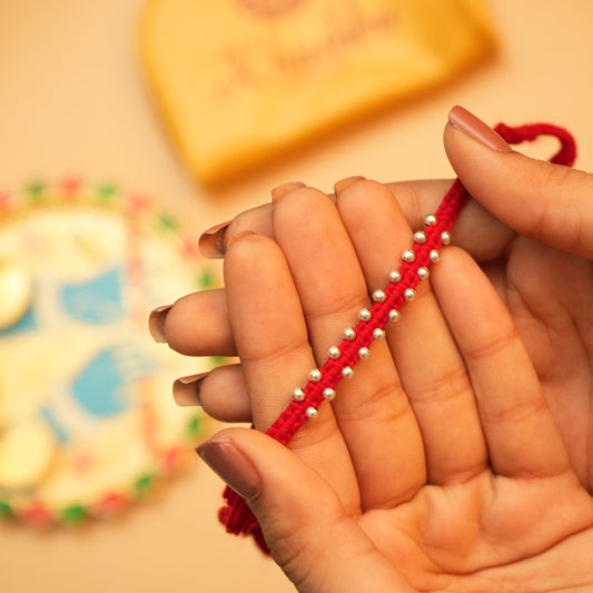 Unique Silver Rakhi with Bud Details