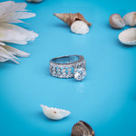 Load image into Gallery viewer, Silver ring with unique design and large white center stone, perfect for girls.