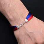 Load image into Gallery viewer, Timeless silver moli bracelet for men with a striking blue and red combination for a modern flair