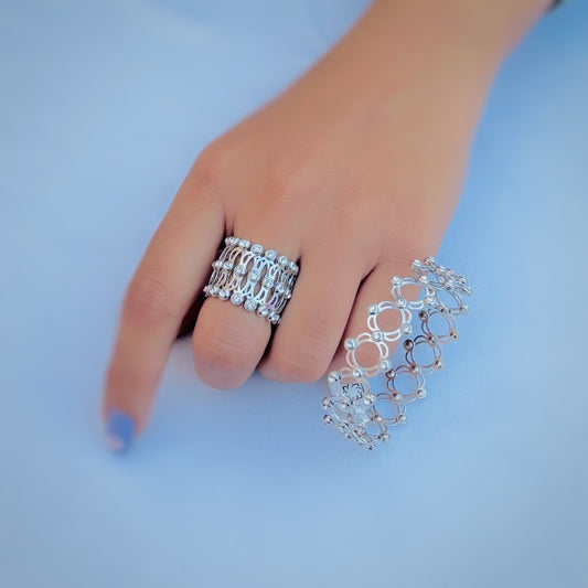 Elegant silver jewelry piece that converts from bracelet to ring.