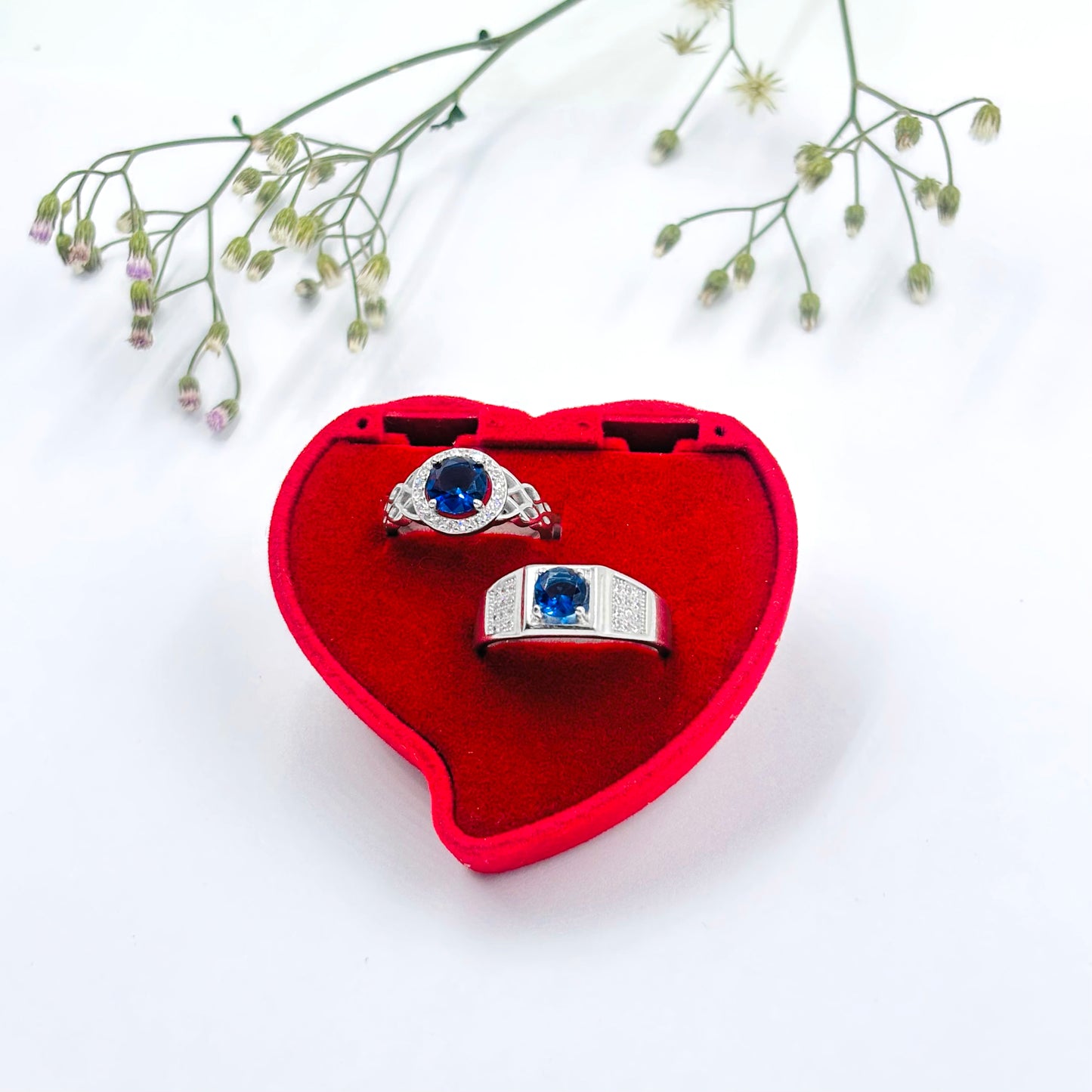 Beautiful Silver Couple Rings, Adorned with a Sparkling Blue Stone.