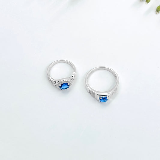 Beautiful Silver Couple Rings, Adorned with a Sparkling Blue Stone.