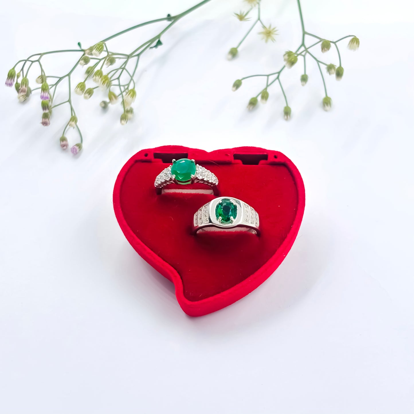 Stylish Silver Couple Rings with Elegant Green Stone in the Middle.