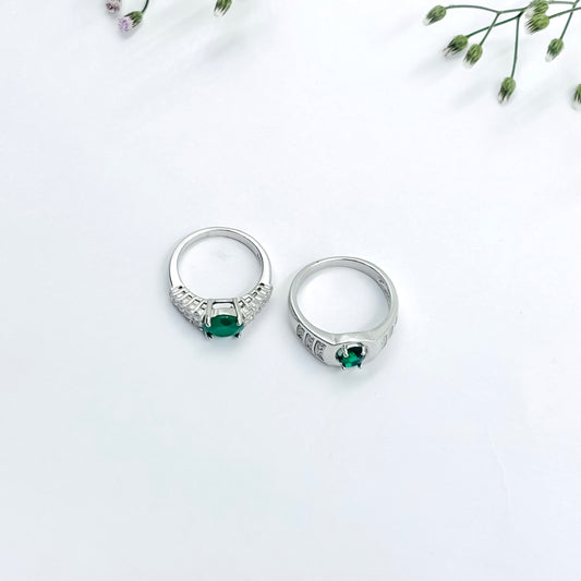 Stylish Silver Couple Rings with Elegant Green Stone in the Middle.
