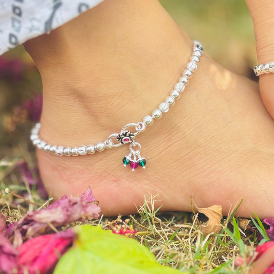 Silver Anklet Featuring a Majestic Peacock Engraving in the Center.