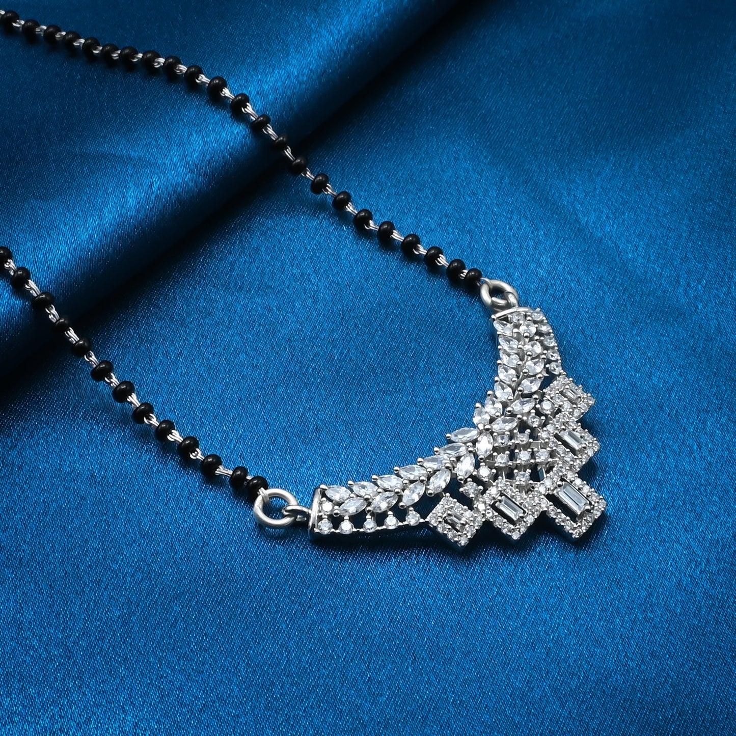 Stylish Silver Mangalsutra with Intricate Flower Motif and Black Beads