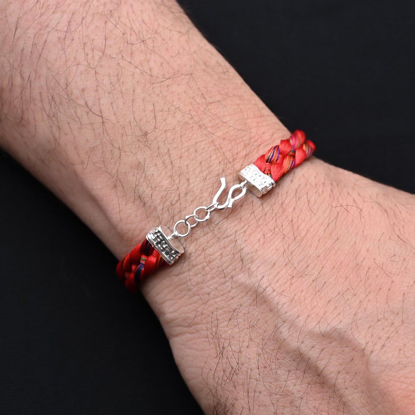 Timeless silver Kalava moli bracelet with a vibrant royal red thread, adding a bold and stylish flair