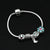 Elegant silver bracelet featuring a supple design and solitaire stone.