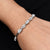 Elegant bracelet with rounded gemstones set in sterling silver.