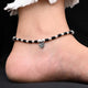 Stylish anklet with sterling silver, black beads, and plant accents for girls.