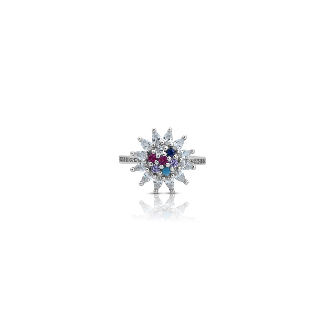 Chic silver ring featuring white stones and a bold colorful gem.