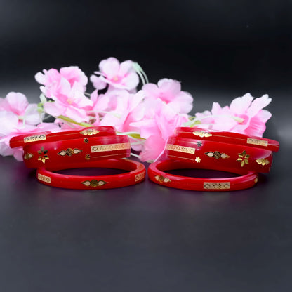 Red Gold Bangle Set Featuring Swastika Design – Stylish & Cultural.