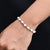 Elegant bracelet with natural pearls set in sterling silver.