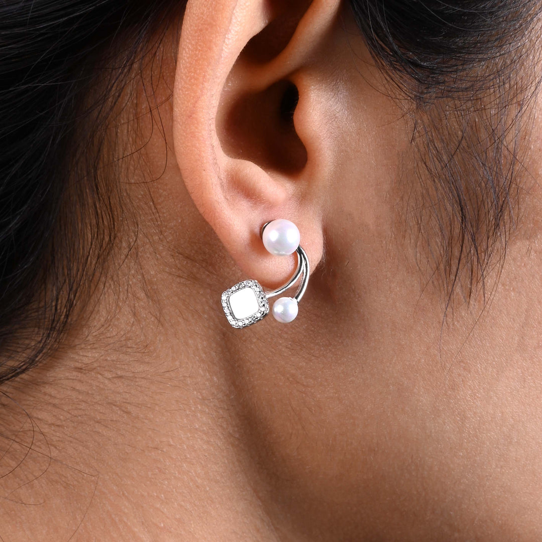 Trendy Silver Earrings with White Moti Finish.