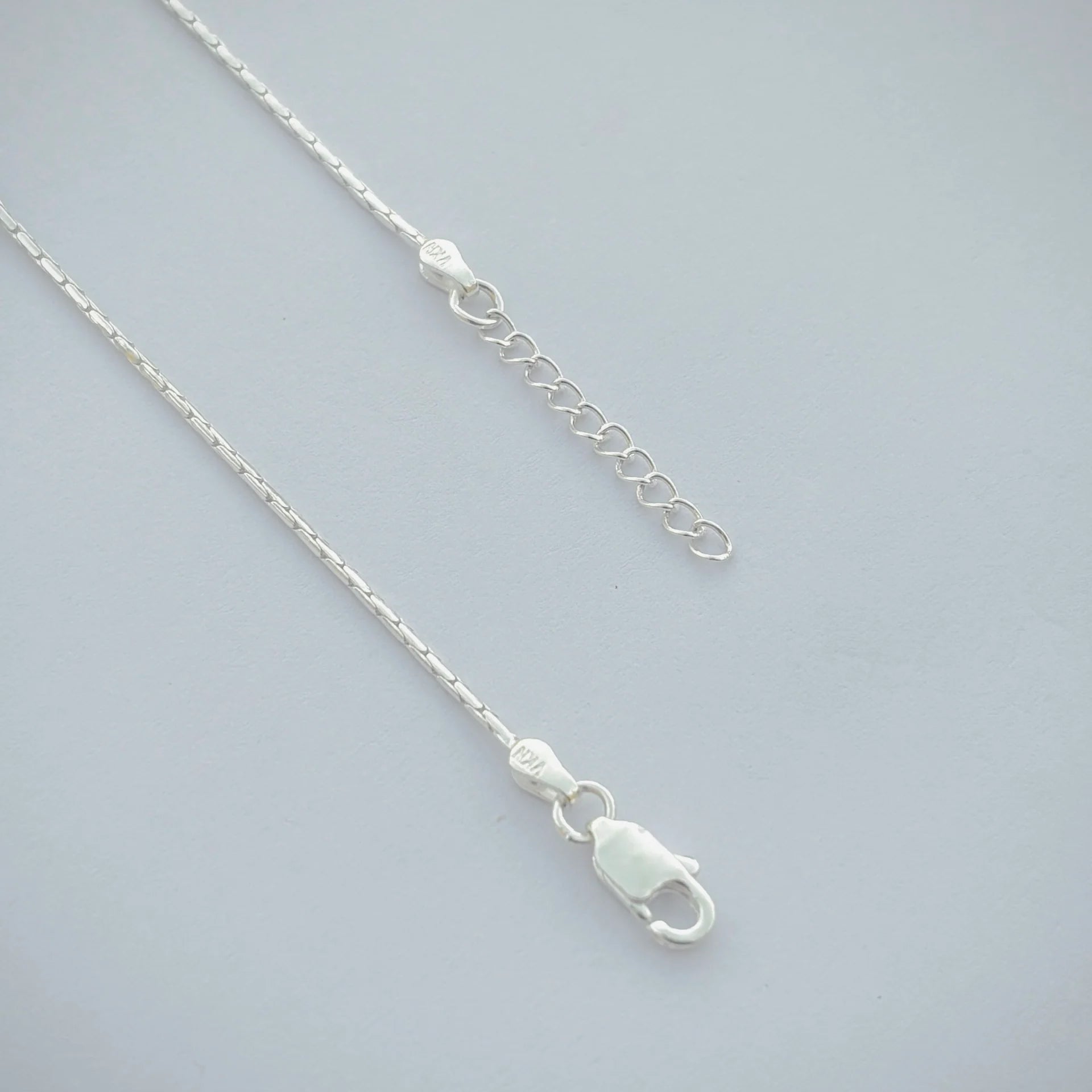 Sleek Silver Anklet with Elegant Bead Accents