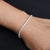 Men's silver bracelet with a simple chain design.