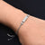 Stylish sterling silver bracelet with a modern square motif for girls.