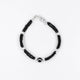 Girls' bracelet featuring a sterling silver black evil eye and black beads.