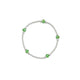 Trendy silver bracelet with green beads designed for girls.