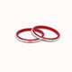 Silver and beautiful red plastic bangles in a pair.