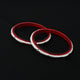 Stylish silver and red plastic bangles, available as a pair.