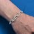 Men's bracelet featuring a sleek chain link pattern in sterling silver.