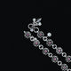 Trendy anklet with stunning purple stone flowers and silver design.