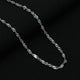 Elegant silver chain featuring glossy round links for a sleek look.