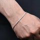 Simple sterling silver bracelet featuring a delicate thin chain.