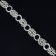 Stylish bracelet in sterling silver with interlinked chain pattern.