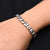 Sterling silver bracelet featuring gold and silver cross design, tailored for boys.