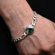 Boys' bracelet featuring a green gem stone set in sterling silver.