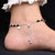 Sterling silver anklet with red gem stone, silver, and black beads for girls.