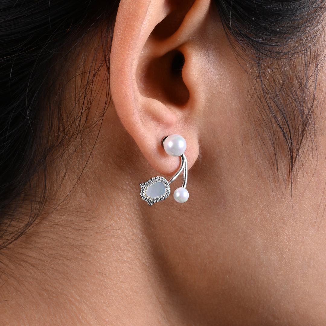 Stylish Silver Earrings with White Moti and Floral Accent.